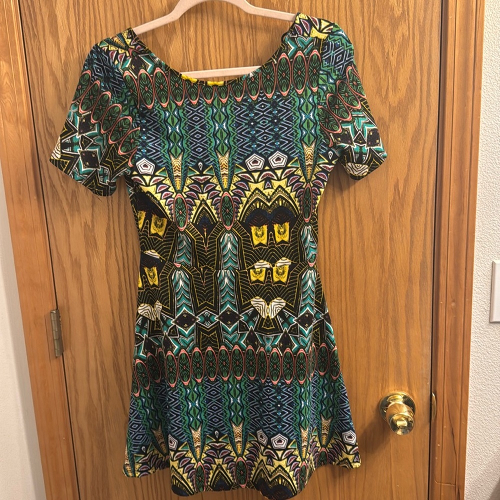 Fun mini dress with open back size large